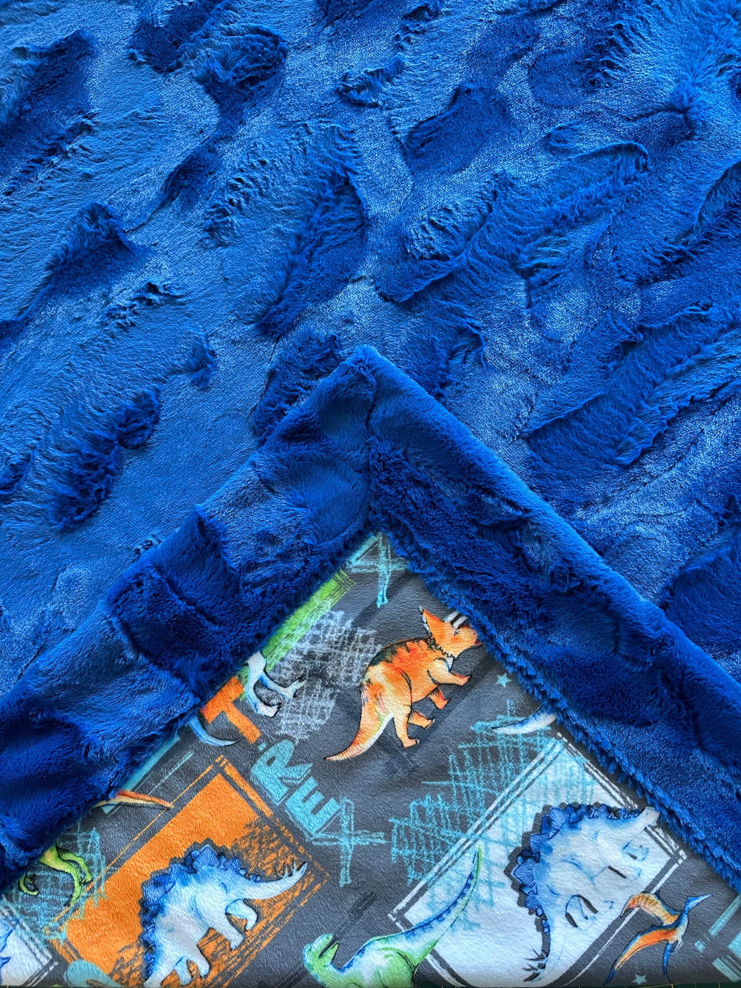 T-Rex Graphite on Royal Blue Hide Toddler Blanket 45x55 (get a pillocase to match for $26)